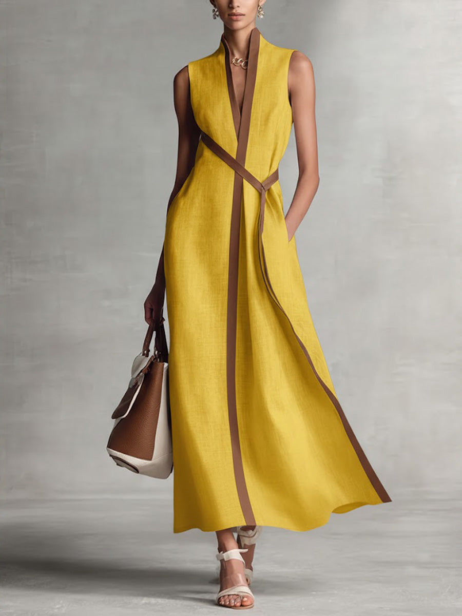 Burgundy Ashley sleeveless maxi dress by THE WHITMORE FAMILY, flowing fabric with a fitted bodice and ankle-length skirt.