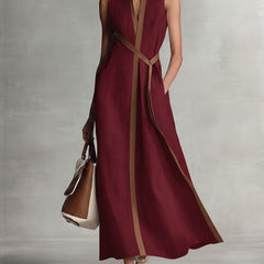 Burgundy Ashley sleeveless maxi dress by THE WHITMORE FAMILY featuring a flowing silhouette and elegant design.