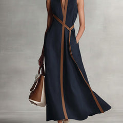 Burgundy Ashley sleeveless maxi dress by THE WHITMORE FAMILY, flowing fabric and elegant design perfect for summer wear.
