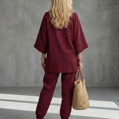 Burgundy Georgiana V-neck tunic and gathered trouser set by THE WHITMORE FAMILY, featuring a stylish, coordinated outfit.