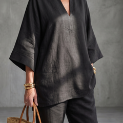 Georgia V-neck tunic and gathered trousers set by THE WHITMORE FAMILY, in burgundy, shown on a model.
