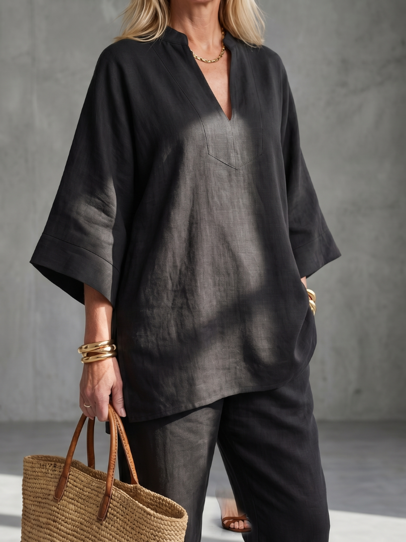 Georgia V-neck tunic and gathered trousers set by THE WHITMORE FAMILY, in burgundy, shown on a model.