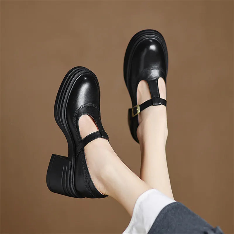 Red Barbara Chunky Pumps Mary Janes by THE WHITMORE FAMILY, stylish leather shoes with chunky soles and classic design.