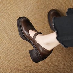 Red Barbara chunky pumps Mary Janes by THE WHITMORE FAMILY with rounded toes and stylish ankle straps.