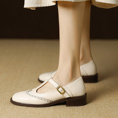 Beige Suzy Mary Janes by THE WHITMORE FAMILY, stylish girls' shoes with classic Mary Jane design and comfortable fit.