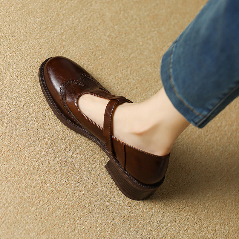 Beige Suzy Mary Janes by THE WHITMORE FAMILY, stylish kids' shoes with rounded toes and strap closure, size 5.