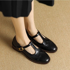 Beige Suzy Mary Janes by THE WHITMORE FAMILY, stylish shoes with classic design and comfortable fit, size 5.