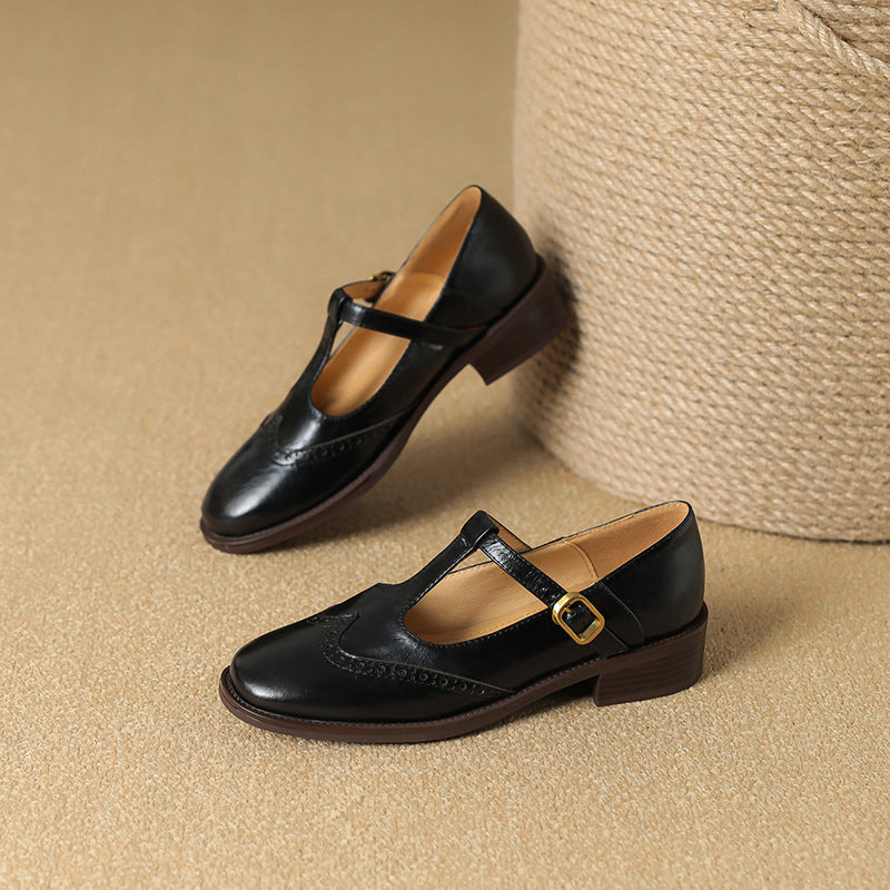 Beige Suzy Stylish Mary Janes by THE WHITMORE FAMILY with rounded toe and ankle strap, perfect for casual or dressy occasions.