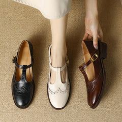 Beige Suzy Mary Janes by THE WHITMORE FAMILY, stylish women's shoes with classic Mary Jane design and comfortable fit.