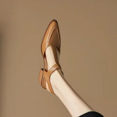 Light brown Madeleine Classic Buckle Shoes by THE WHITMORE FAMILY, featuring a stylish buckle and comfortable design.