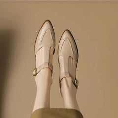 Light brown Madeleine classic buckle shoes by THE WHITMORE FAMILY, featuring a timeless design and comfortable fit.