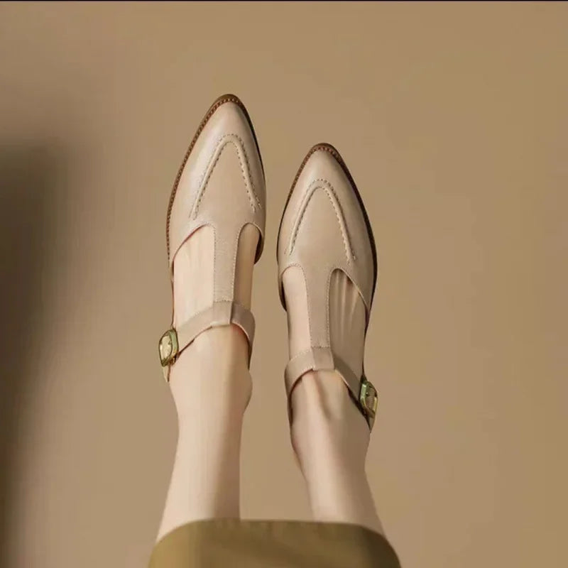 Light brown Madeleine classic buckle shoes by THE WHITMORE FAMILY, featuring a timeless design and comfortable fit.