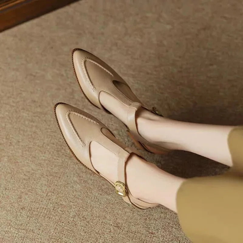 Light brown Madeleine Classic Buckle Shoes by THE WHITMORE FAMILY, featuring a stylish buckle and elegant design for everyday wear.