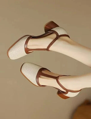 Off-white Isava mid heel leather shoes by THE WHITMORE FAMILY, featuring a stylish design and comfortable mid heel.