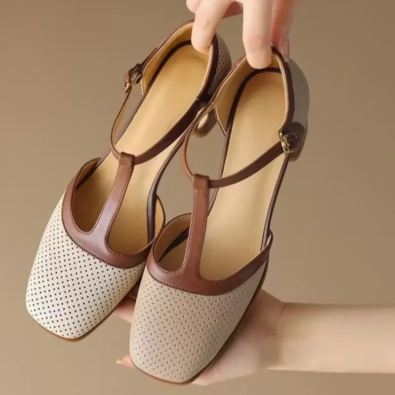 Off-white Isava mid-heel leather shoes by THE WHITMORE FAMILY, featuring elegant design and comfortable fit.