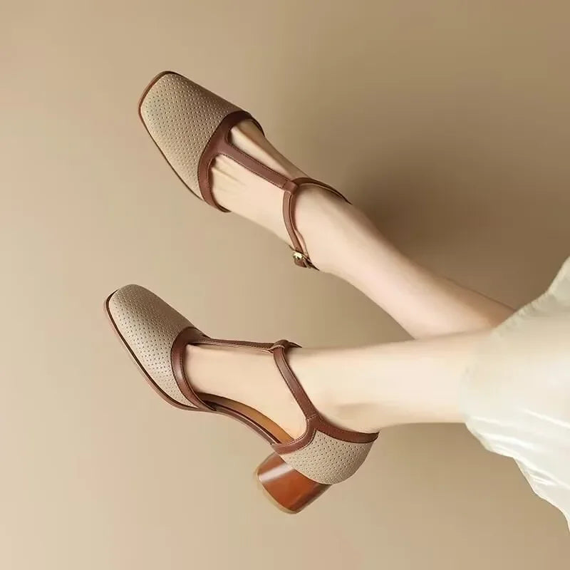 Off-white Isava mid-heel leather shoes by THE WHITMORE FAMILY, stylish footwear with a sleek design and comfortable fit.