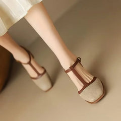 Off-white Isava mid-heel leather shoes by THE WHITMORE FAMILY, featuring a stylish mid heel and sleek leather design.