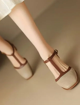 Off-white Isava mid-heel leather shoes by THE WHITMORE FAMILY, featuring a stylish mid heel and sleek leather design.