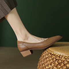 Apricot Heather mid-heeled Mary Janes by THE WHITMORE FAMILY, featuring classic design and comfortable mid-heel style.