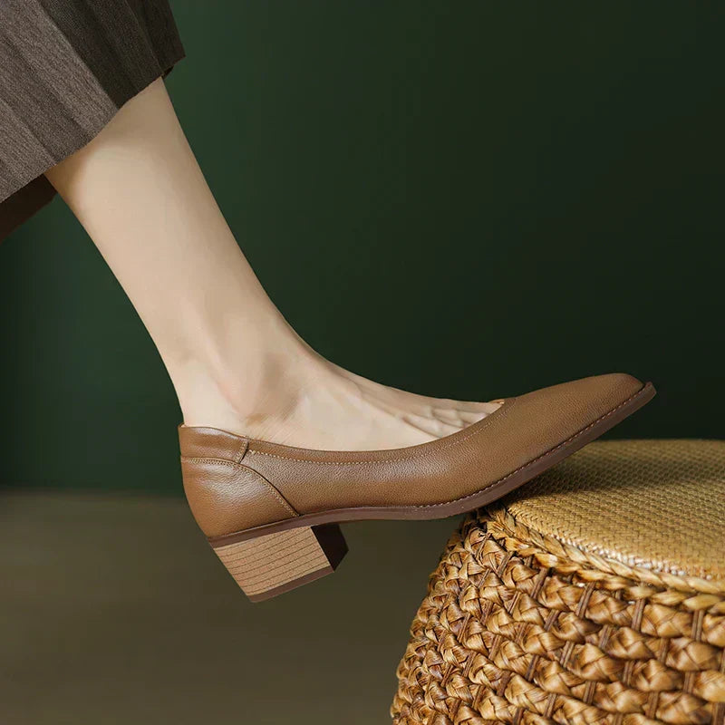 Apricot Heather mid-heeled Mary Janes by THE WHITMORE FAMILY, featuring classic design and comfortable mid-heel style.