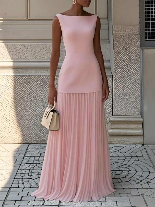 Cream Serena pleated maxi dress by THE WHITMORE FAMILY, flowing fabric with elegant pleats and a fitted bodice.