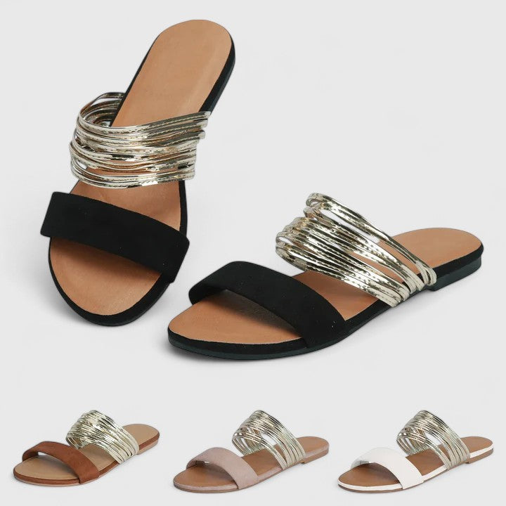 Cream white Lioraen™ elegant sandals by THE WHITMORE FAMILY, featuring stylish straps and a comfortable design.