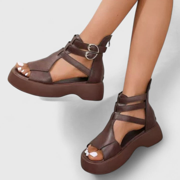 Black Ivana™ orthopedic sandals for women by THE WHITMORE FAMILY, showcasing comfortable straps and supportive sole.