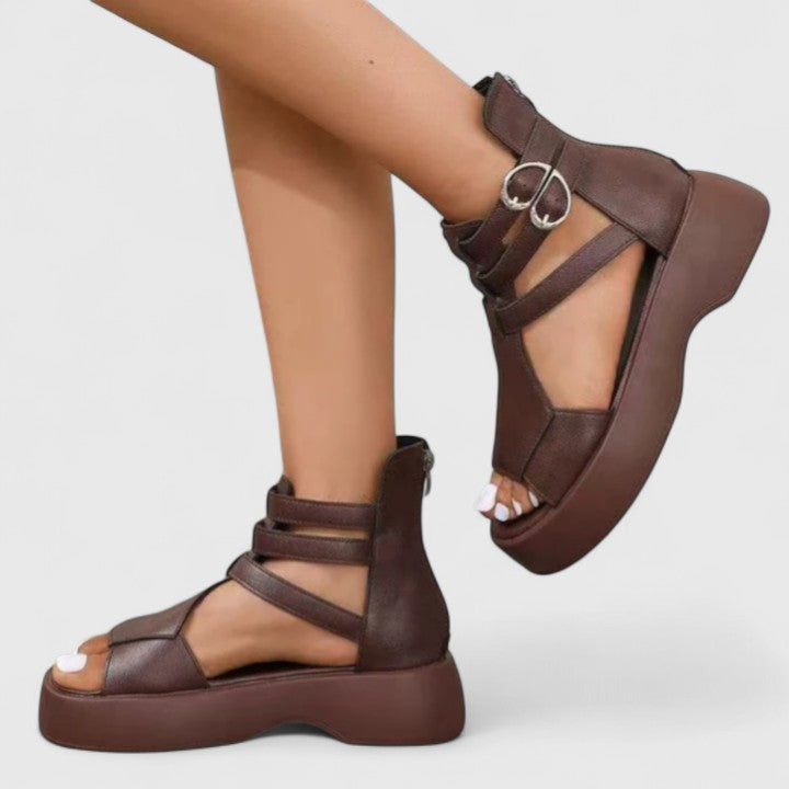 Black Ivana™ orthopedic sandals for women by THE WHITMORE FAMILY, featuring supportive design and comfortable straps.