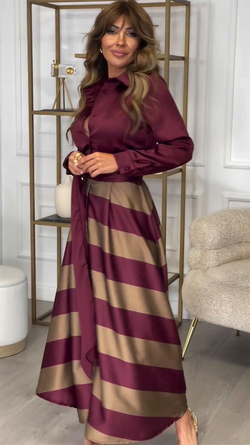 Burgundy Diana striped maxi dress for women by THE WHITMORE FAMILY, featuring a flowing design and stylish pattern.
