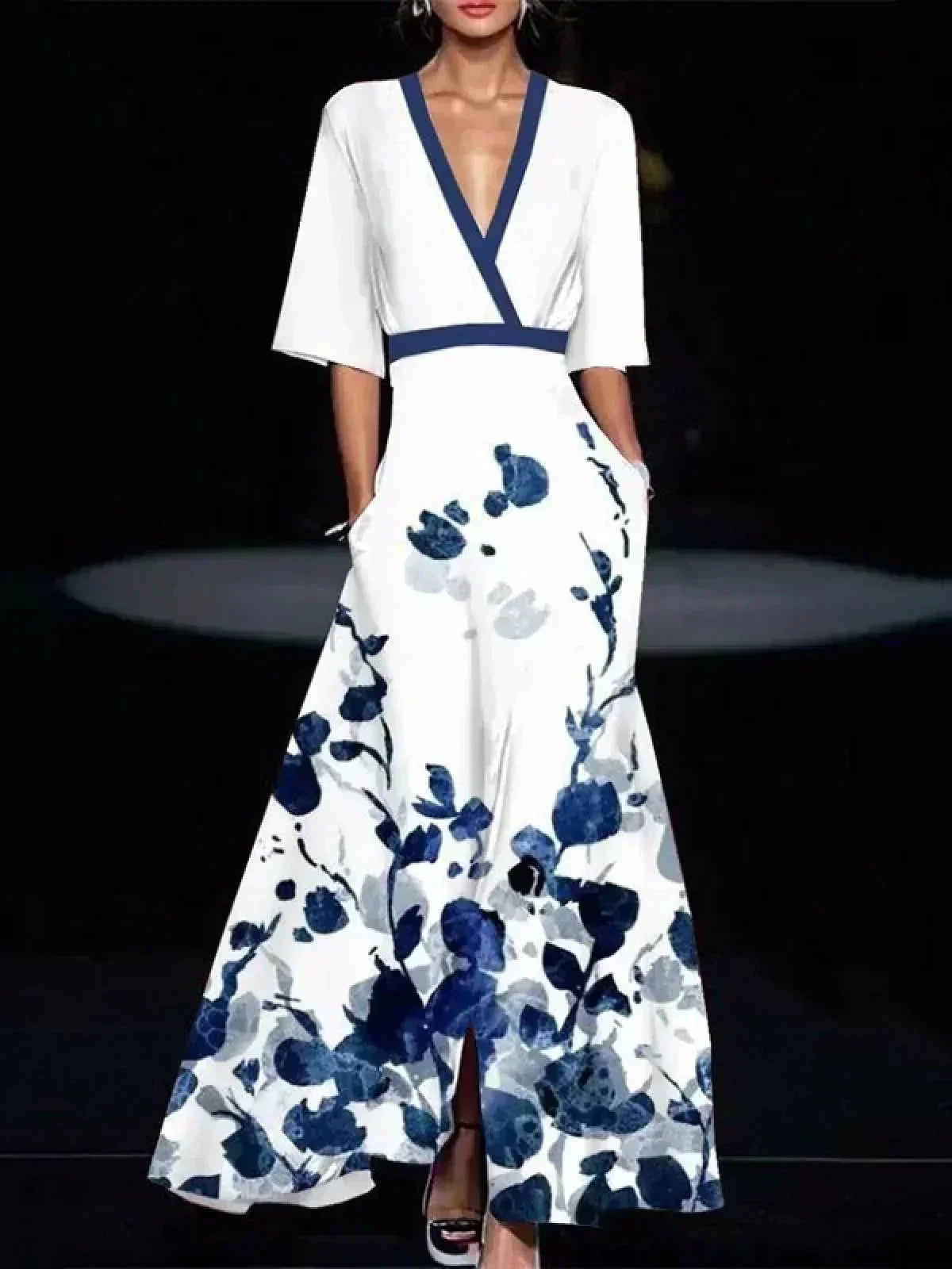Red Barbara elegant flower dress for women by THE WHITMORE FAMILY, showcasing a stylish and sophisticated design.