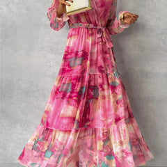 Red and pink floral print summer wrap dress for women by THE WHITMORE FAMILY, featuring a stylish, feminine design.