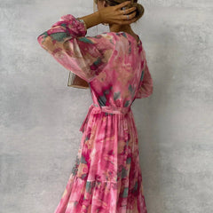 Red and pink floral print summer wrap dress for women by THE WHITMORE FAMILY, featuring a stylish and comfortable design.