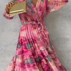 Red and pink floral print summer wrap dress for women by THE WHITMORE FAMILY, featuring a stylish and feminine design.