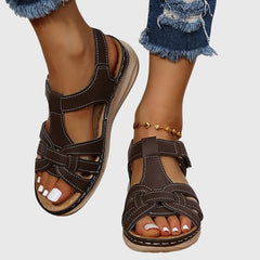 Dark brown Dakota™ orthopedic sandals by THE WHITMORE FAMILY with cushioned soles and supportive straps, designed for comfort.