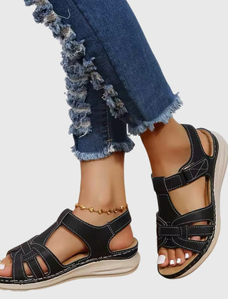 Dark brown Dakota™ orthopedic sandals by THE WHITMORE FAMILY with supportive soles and adjustable straps, designed for comfort.