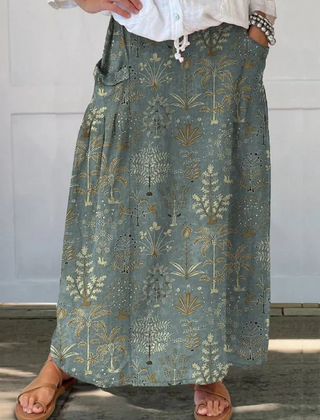 Dark green Carly™ Woodland Vegetation Pattern printed elastic waistband pocket skirt by THE WHITMORE FAMILY showing the skirt's design and pockets.
