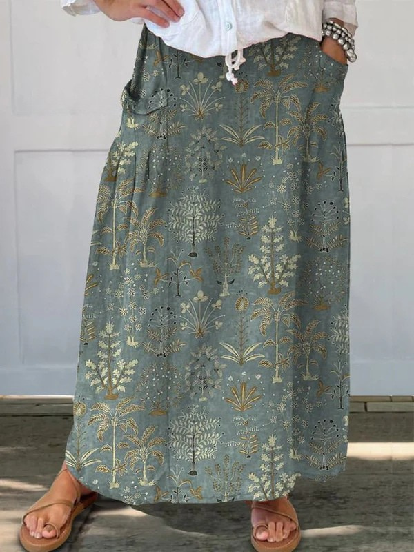 Dark green Carly™ Woodland Vegetation Pattern printed elastic waistband pocket skirt by THE WHITMORE FAMILY showing the skirt's design and pockets.