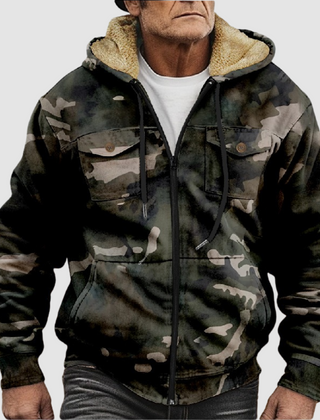 Sam™ camouflage jacket by THE WHITMORE FAMILY, shown in a close-up of the jacket's camouflage fabric and design details.
