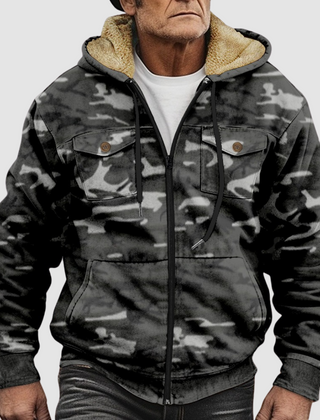 Sam™ camouflage jacket by THE WHITMORE FAMILY, shown with a front view, featuring green and brown camo pattern and zip closure.