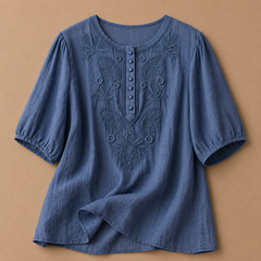 Dark khaki Verena cotton linen blouse by THE WHITMORE FAMILY, shown with a relaxed fit and breathable fabric.
