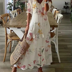 Beige Lana boho maxi dress by THE WHITMORE FAMILY, figure-flattering style with flowing fabric and bohemian design.