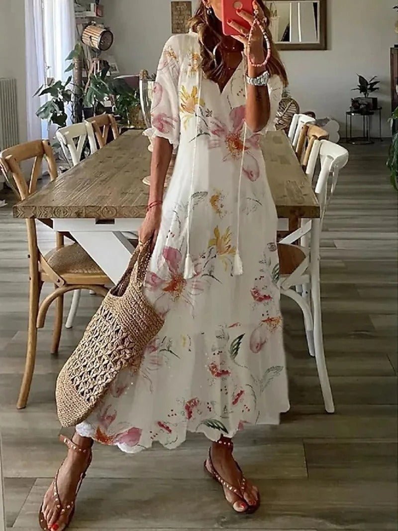 Beige Lana boho maxi dress by THE WHITMORE FAMILY, figure-flattering style with flowing fabric and bohemian design.