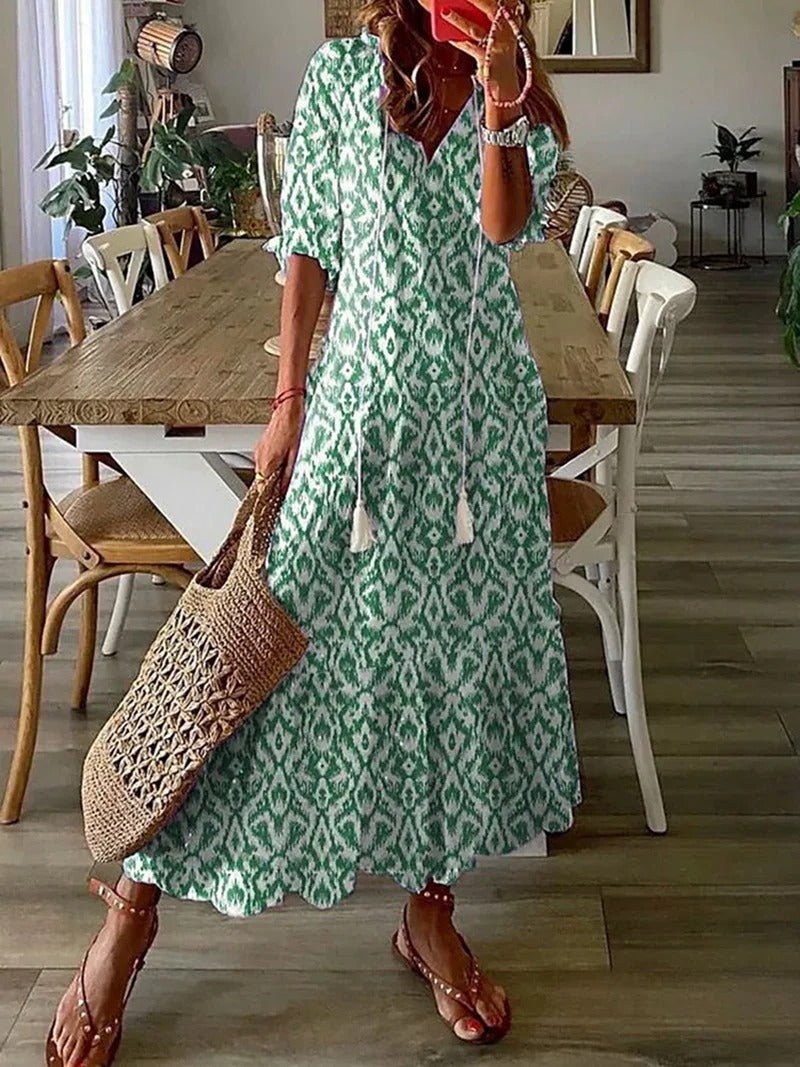 Beige Lana boho maxi dress by THE WHITMORE FAMILY, figure-flattering style with flowing fabric and bohemian design.