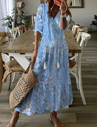 Beige Lana boho maxi dress by THE WHITMORE FAMILY, flowing, figure-flattering design with bohemian style and relaxed fit.