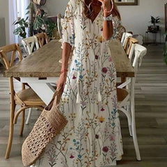 Beige Lana boho maxi dress by THE WHITMORE FAMILY, figure-flattering silhouette with flowing fabric and bohemian style.