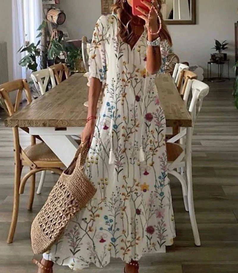Beige Lana boho maxi dress by THE WHITMORE FAMILY, figure-flattering silhouette with flowing fabric and bohemian style.