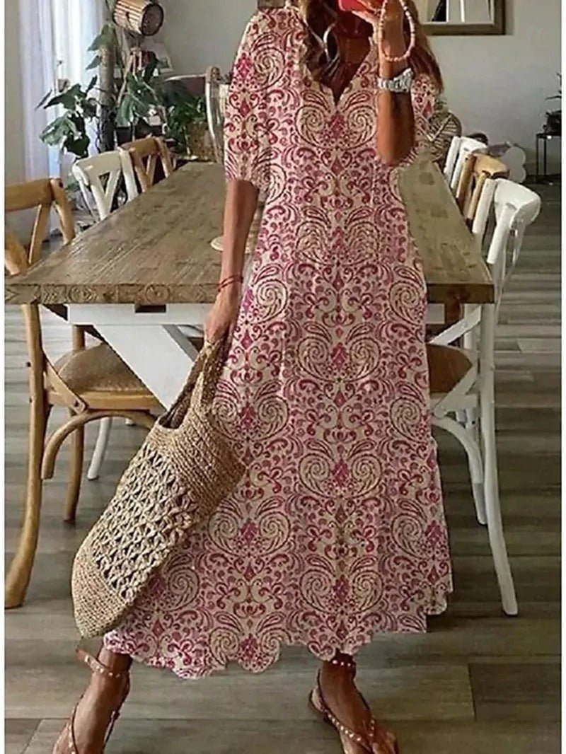 Beige Lana boho maxi dress by THE WHITMORE FAMILY, figure-flattering design, flowing fabric, and relaxed bohemian style.