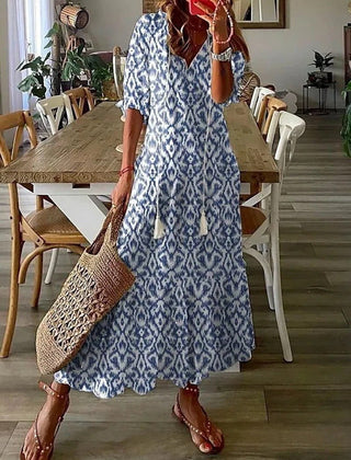Beige Lana boho maxi dress by THE WHITMORE FAMILY, featuring a figure-flattering silhouette and flowing fabric.