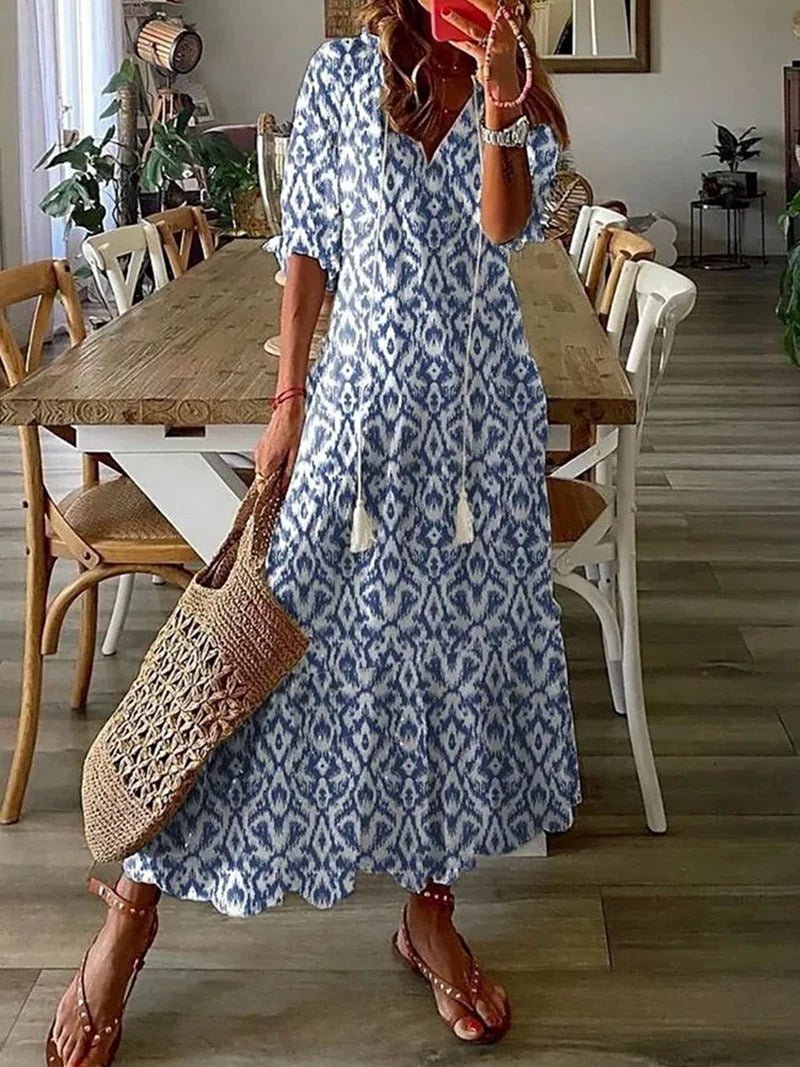Beige Lana boho maxi dress by THE WHITMORE FAMILY, featuring a figure-flattering silhouette and flowing fabric.