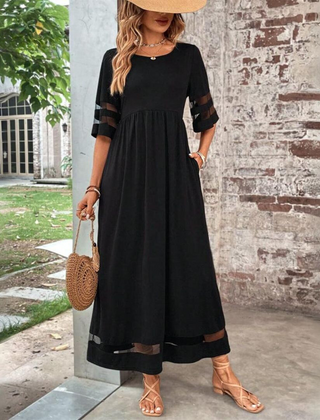 Black Aubrey Flattering Tummy-Smoothing Midi Dress by THE WHITMORE FAMILY, showcasing a sleek, fitted silhouette and elegant design.